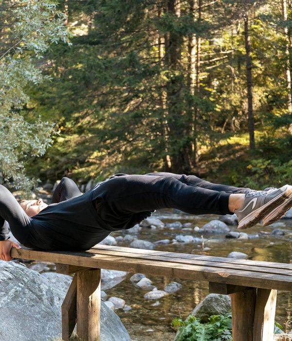 A focused man doing a challenging bodyweight exercise with good form.